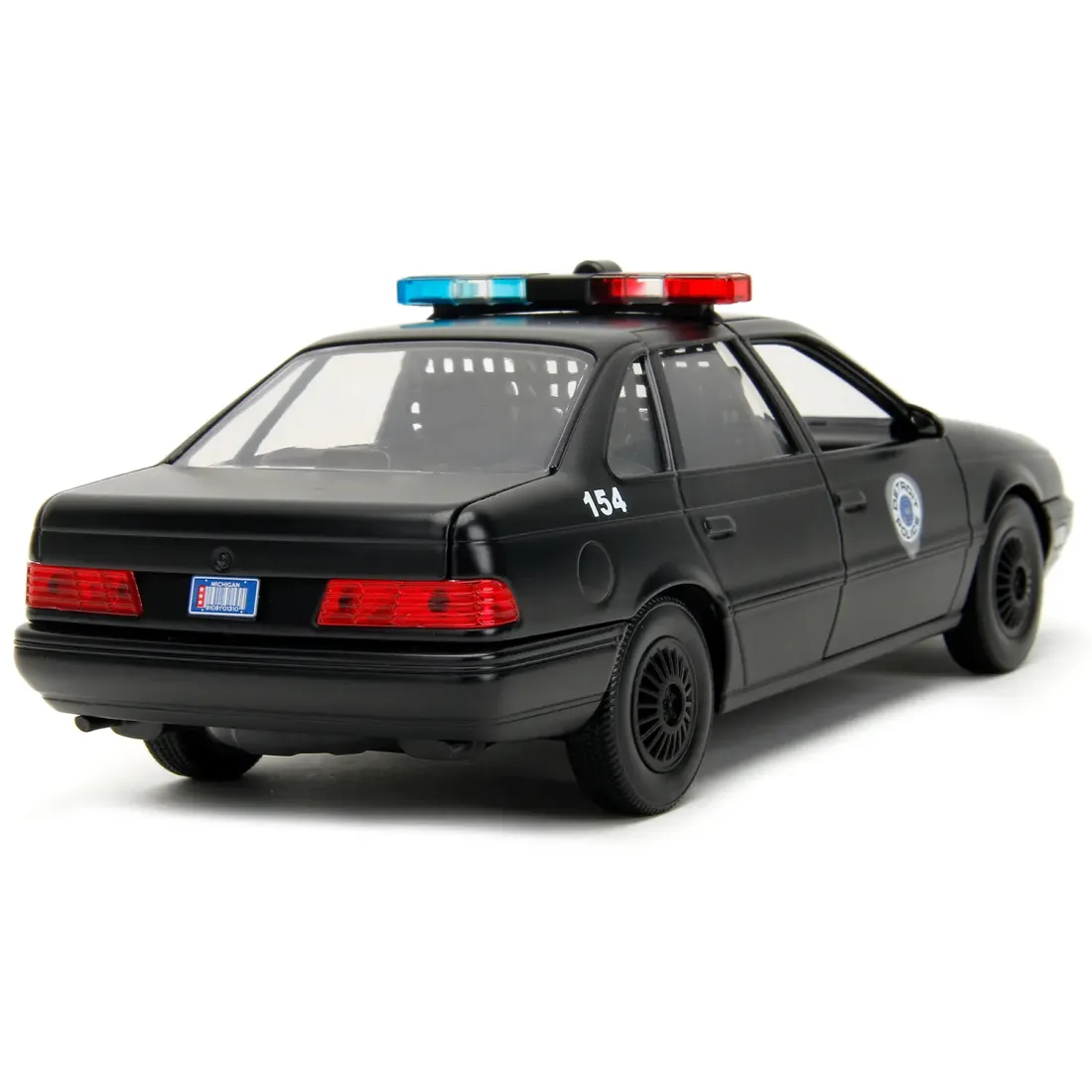 Модель Машинки c Фигуркой Hollywood Rides 1:24 1986 Ford Taurus with Robocop figure 33743